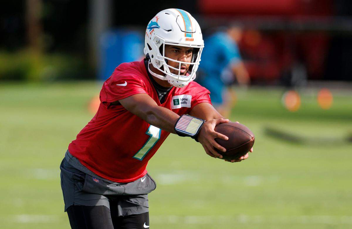 Miami Dolphins quarterback Tua Tagovailoa (1) do drills during practice at Baptist Health Training Complex in Hard Rock Stadium on Wednesday, November 30, 2022 in Miami Gardens, Florida.