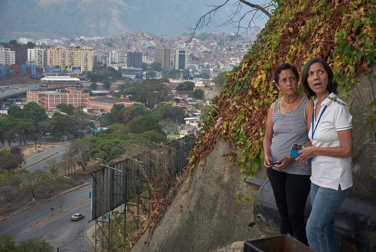 Lifelong friends Marilú Ramírez Sánchez and Thibisay Rodríguez have differing political views as the crisis in Venezuela worsens. Photo courtesy of Humberto Duarte