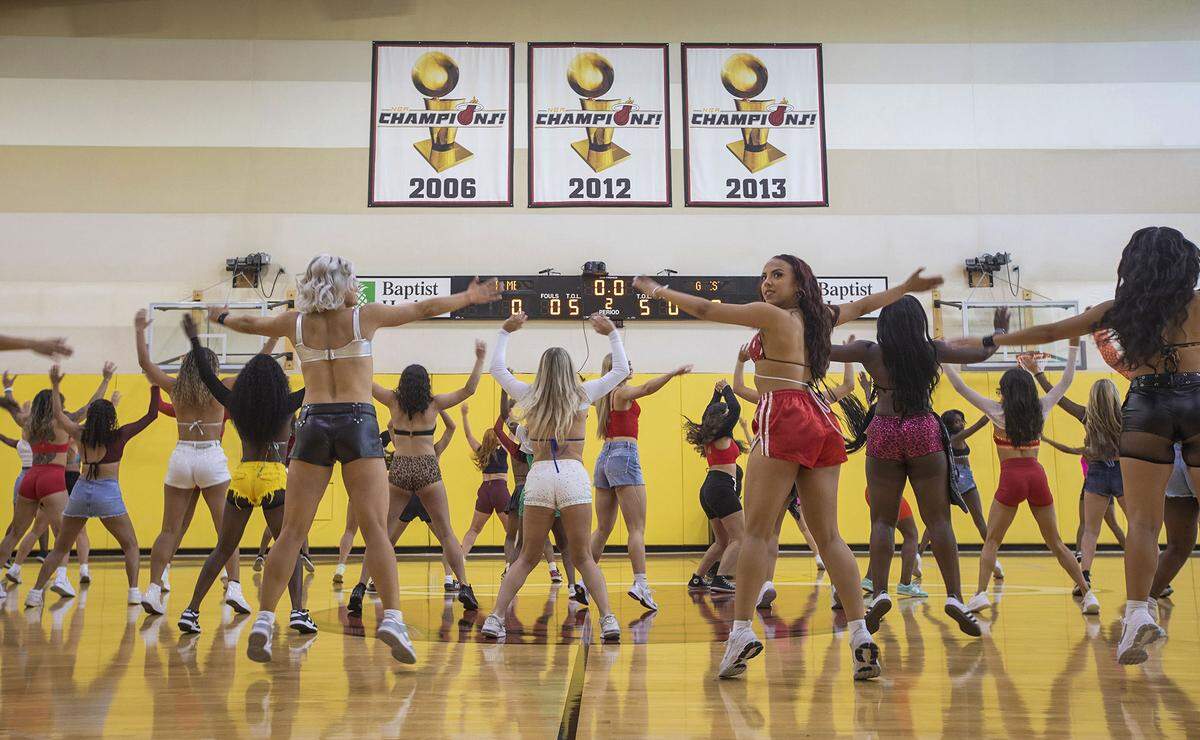 Contestants go through some moves during auditions for a spot on next season's Heat dancers team.