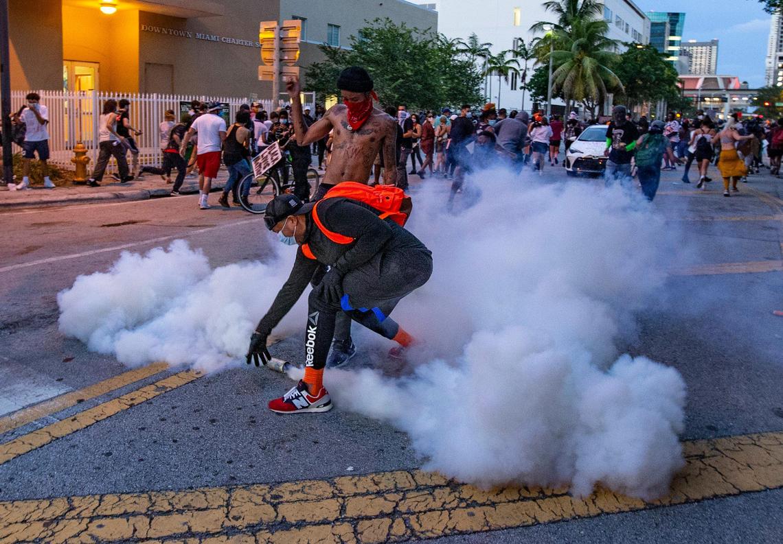 City of Miami Police fire tear gas at demonstrators during George Floyd protest in downtown Miami on Saturday, May 30, 2020.