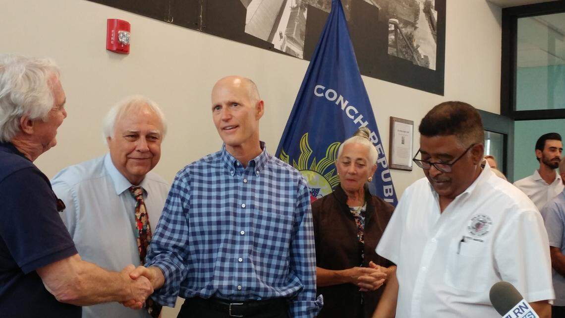 Gov. Rick Scott greets Key West city leaders on June 8, 2018.