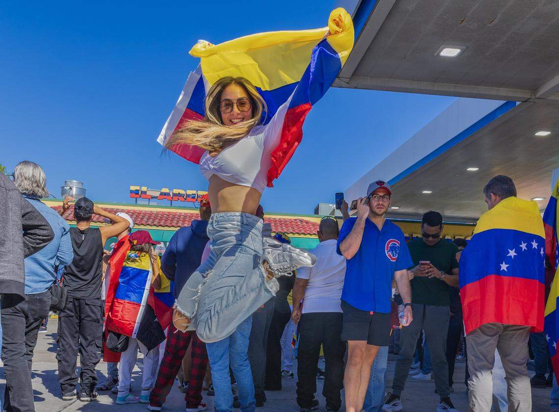 Talla Mendez expresses her excitement as she joined group of Venezuelan exiles living in South Florida celebrating outside of El Arepazo in Doral, Florida, after the United States attacked Venezuela and captured Venezuelan leader Nicolás Maduro,  on Jan. 3, 2026.