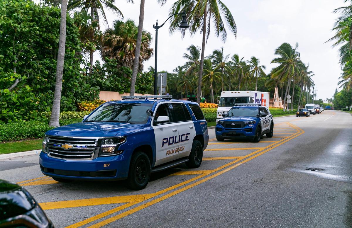 Palm Beach police are seen near the entrance of former President Donald Trump’s Mar-a-Lago home on Tuesday, Aug. 9. The FBI conducted a search of Donald Trump’s Mar-a-Lago estate on Monday.
