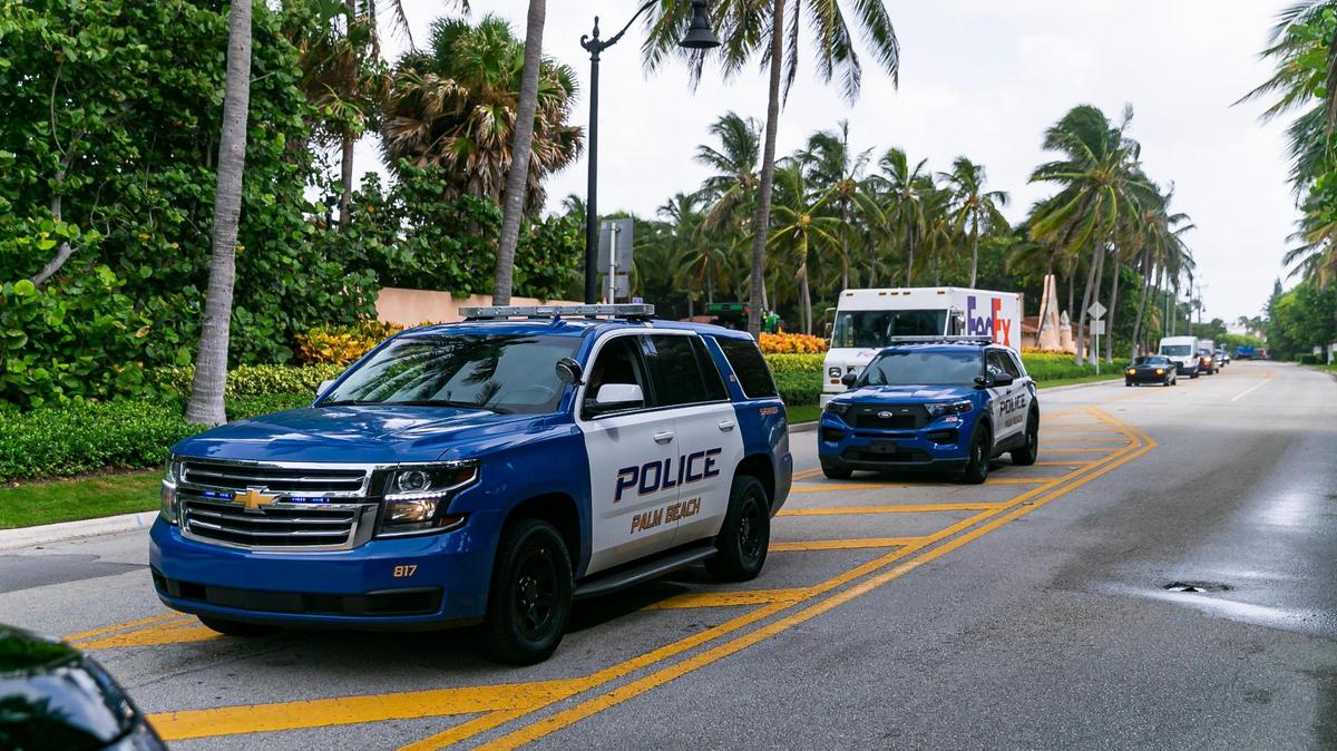 Palm Beach police are seen near the entrance of former President Donald Trump’s Mar-a-Lago home on Tuesday, Aug. 9. The FBI conducted a search of Donald Trump’s Mar-a-Lago estate on Monday.