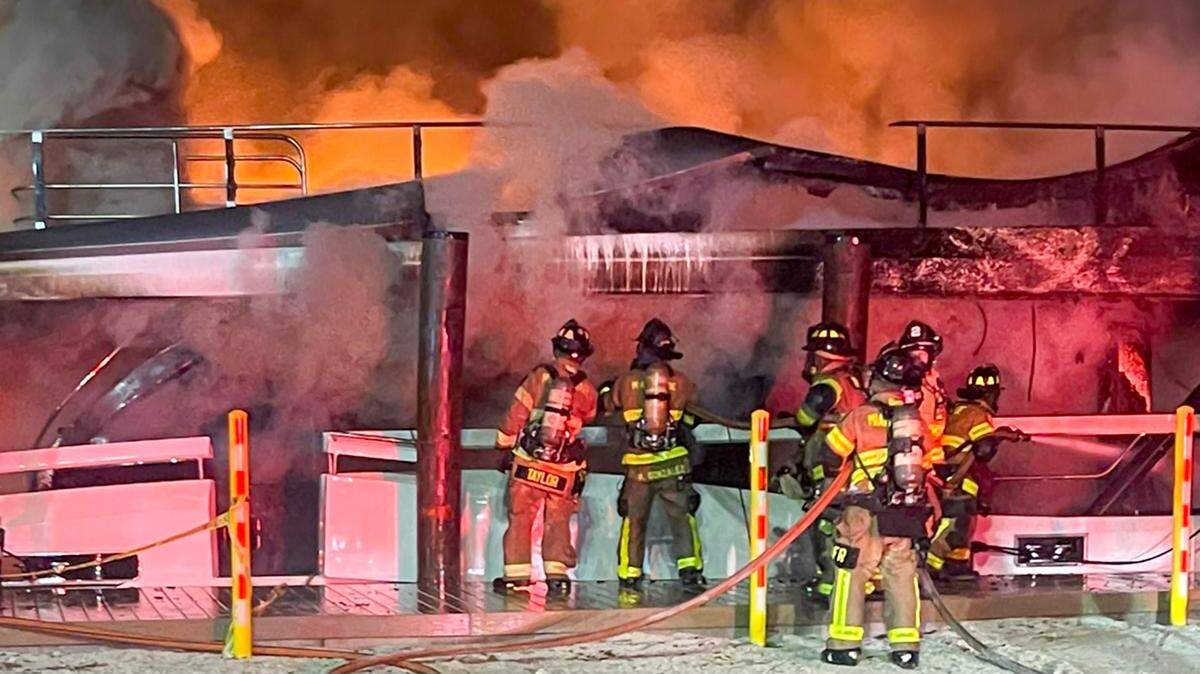 The yacht fire outside The Booby Trap proved a tough fight for Miami-Dade Fire Rescue workers.