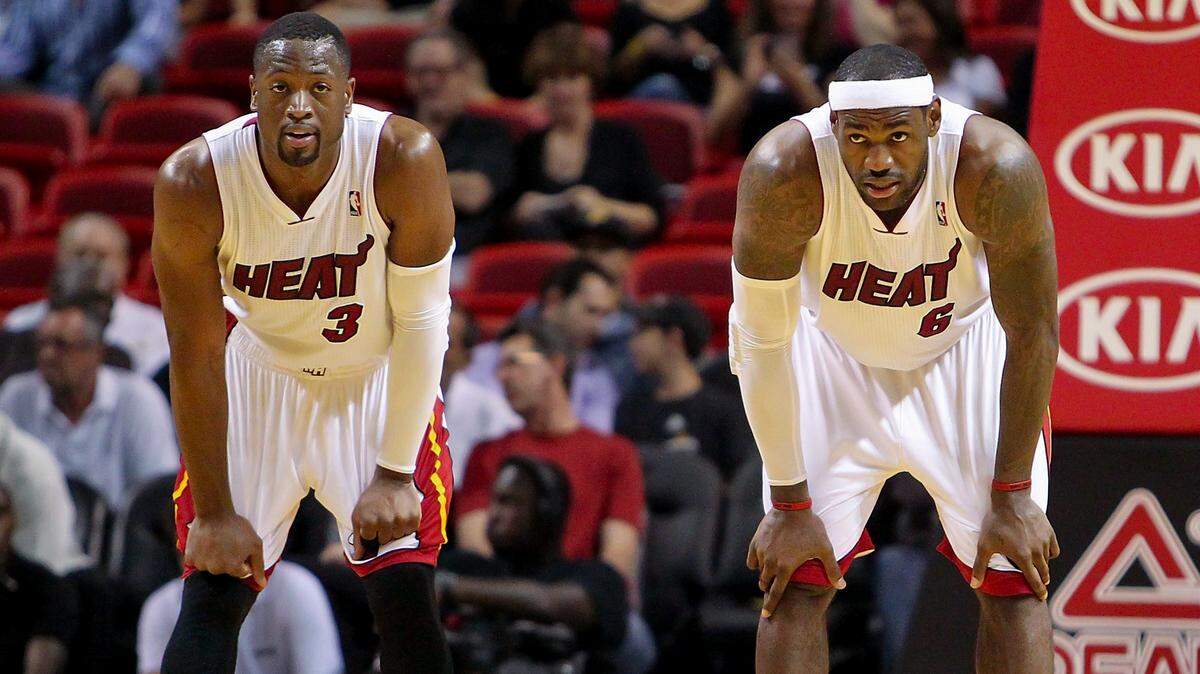 Dwyane Wade, left, and Lebron James during a preseason game between the Detroit Pistons against the Miami Heat at the AmericanAirlines Arena in Miami on Oct. 18, 2012. In January 2026, a former Miami Heat security employee, retired Miami police officer Marcos Tomas Perez, was sentenced to three years in prison for stealing hundreds of   Miami Heat jerseys, including those worn in games by James and Wade.