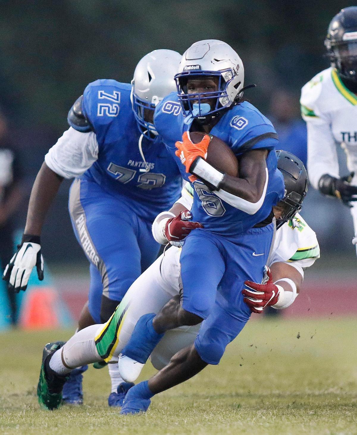 Dillard Panthers running back Christopher Johnson (6) carries the ball against Rock Creek Christian Academy during football game on Friday, August 26, 2022 at Dillard High School in Fort Lauderdale. Andrew Uloza / for Miami Herald