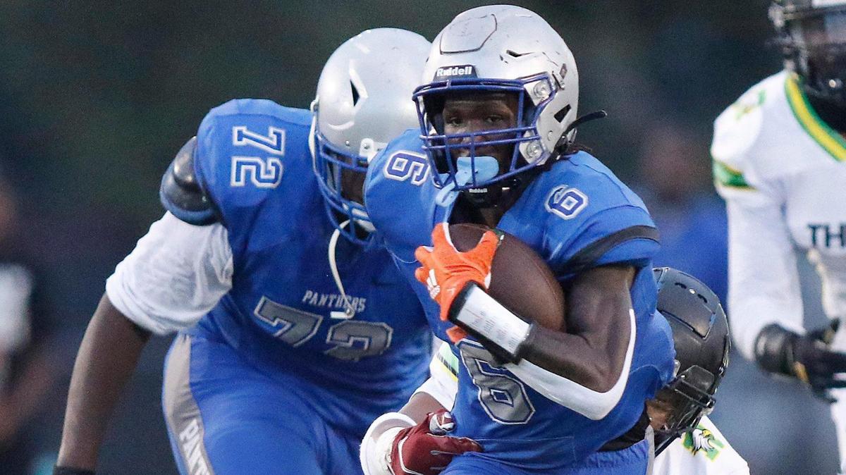 Dillard Panthers running back Christopher Johnson (6) carries the ball against Rock Creek Christian Academy during football game on Friday, August 26, 2022 at Dillard High School in Fort Lauderdale. Andrew Uloza / for Miami Herald