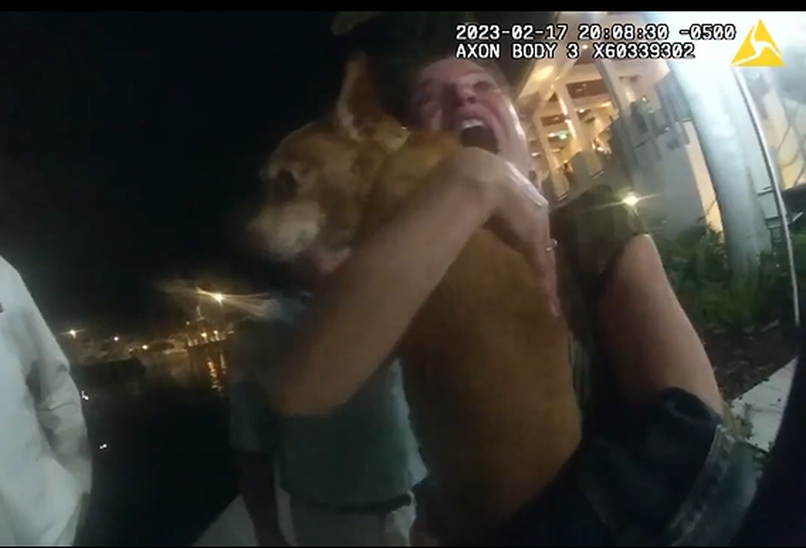 The video concludes with Tinkerbell reuniting with her disbelieving owners on a dock, where both she and the officer were repeatedly hugged.