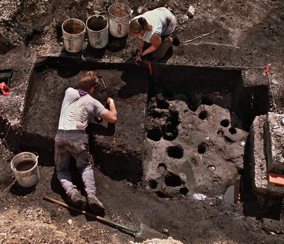Archaeologists dig at the site of the 2,000-year-old Miami Circle at the mouth of the Miami River shortly after its discovery in 1998.