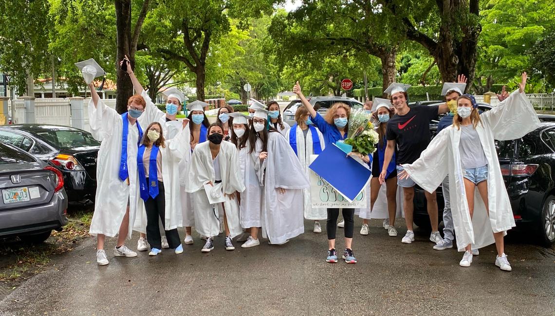 At center is Amy Scott, an IB Language Arts teacher at Coral Reef Senior High, who retired after 44 years. Her students came to see her at home in Coral Gables on Thursday, June 4, 2020.