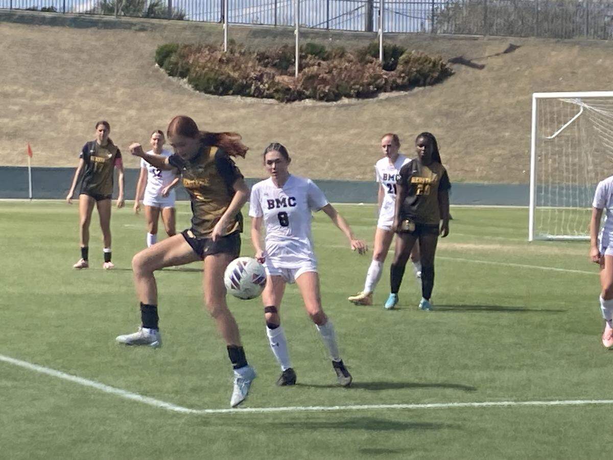 American Heritage’s Julianna Soto looks to control possession near Orlando Bishop Moore’s goal during their Class 4A state girls’ soccer semifinal on Thursday afternoon at Spec Martin Stadium in DeLand, Fla.