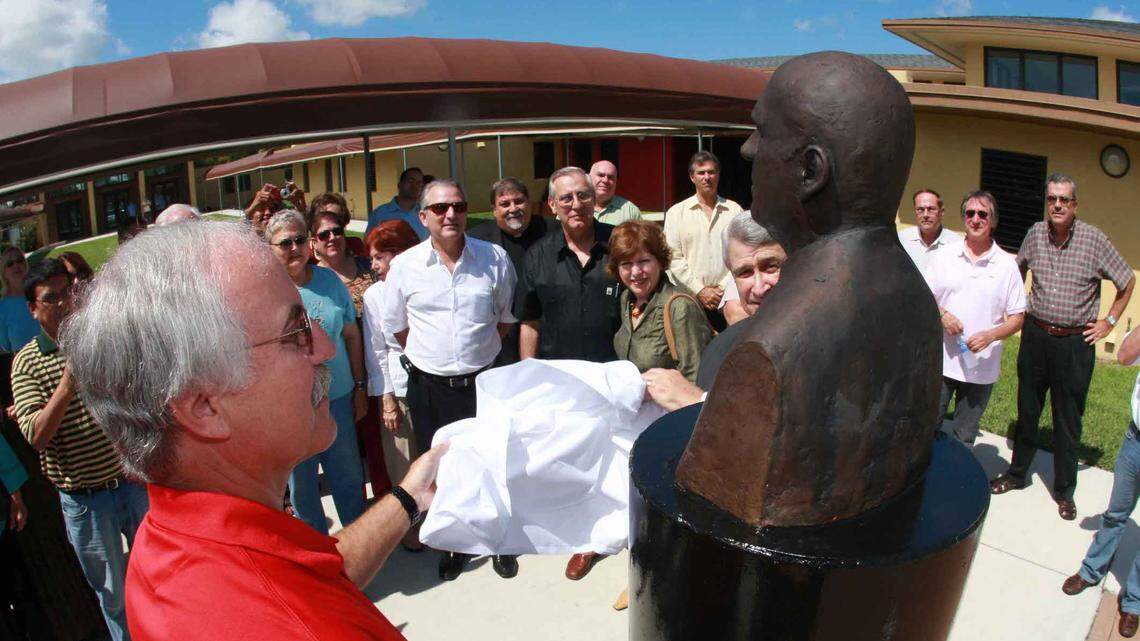 Richard Turcotte of Catholic Charities, with other Operation Pedro Pan veterans, unveils a bust in June 2009 honoring the late Monsignor Bryan Walsh, one of South Florida’s most famous priests and the father of Operation Pedro Pan, which brought thousands of unaccompanied minors to the U.S. from communist Cuba between 1960 and 1962.