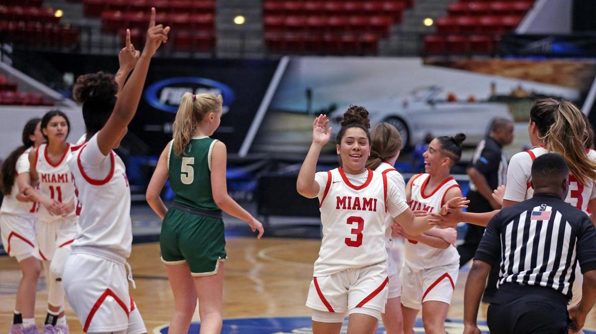 Miami Christian School Samantha Vales (3) and teammates react after defeating St John Neumann High during a girls basketball Class 2A state semifinal in Lakeland on Wednesday, February 23, 2022.