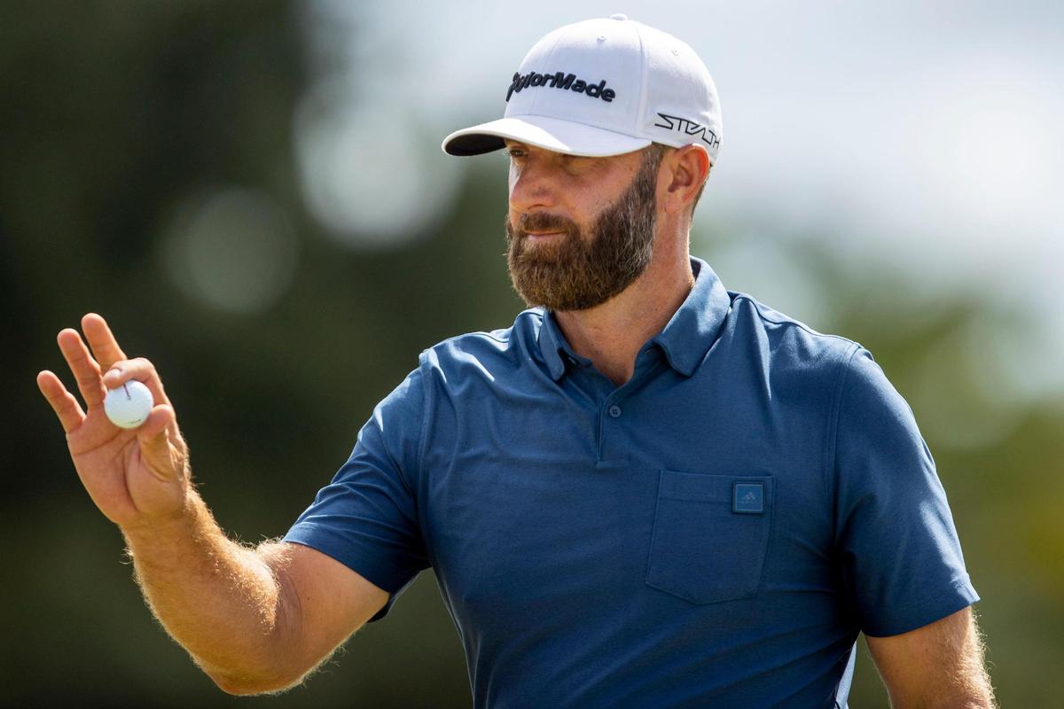 Dustin Johnson reacts to applause at the second hole during the second round at the LIV Golf Invitational Miami at Trump National Doral Golf Club on Saturday, October 28, 2022 in Doral, Fla.