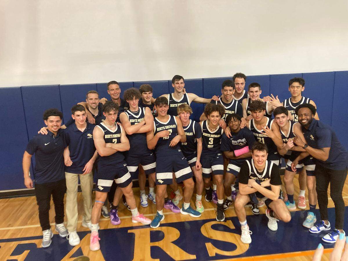 North Broward Prep boys’ basketball team celebrates after clinching its first ever trip to the state final four following a win at Mater Lakes in the Region 4-4A final on Friday night.