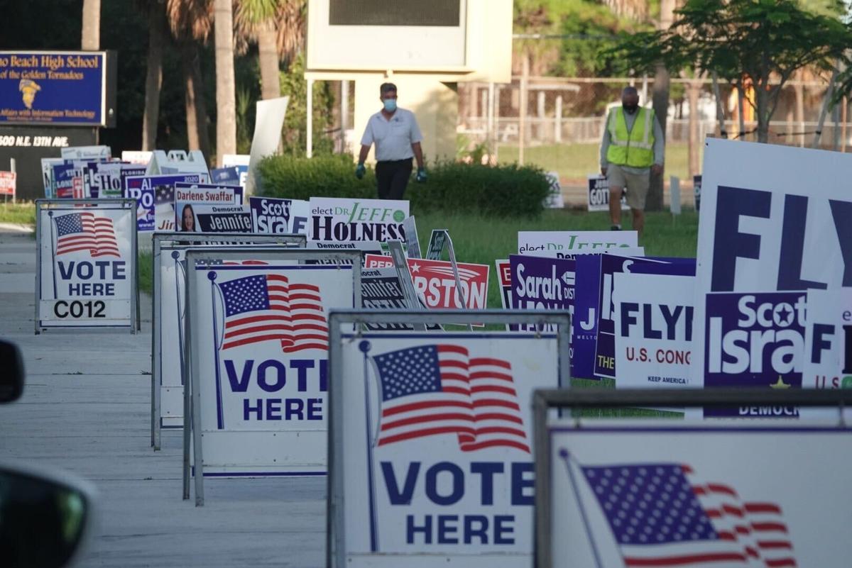 Broward County voters cast their ballot at the Emma Lou Olson Civic Center in Pompano Beach on Primary Day, Tuesday, Aug. 18, 2020.