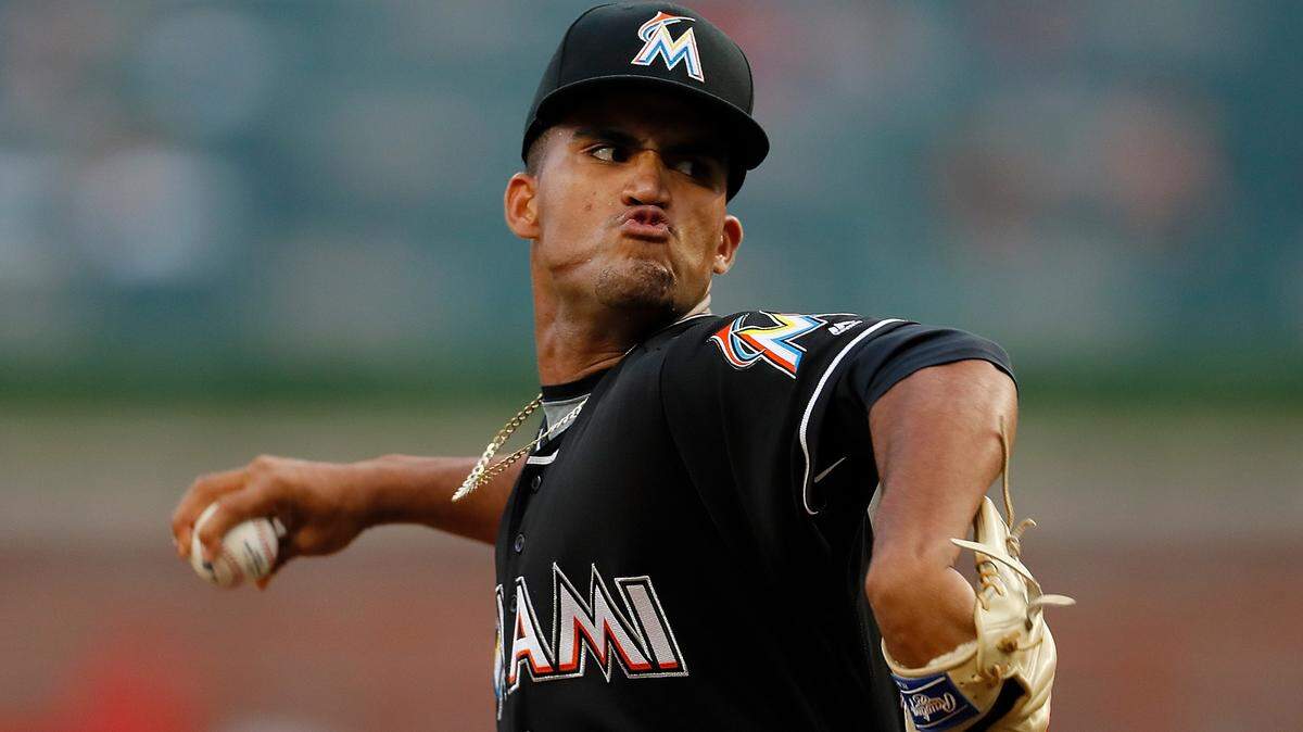 ATLANTA, GA - AUGUST 13:  Merandy Gonzalez #77 of the Miami Marlins pitches in the first inning against the Atlanta Braves during game two of a doubleheader at SunTrust Park on August 13, 2018 in Atlanta, Georgia.  (Photo by Kevin C. Cox/Getty Images)