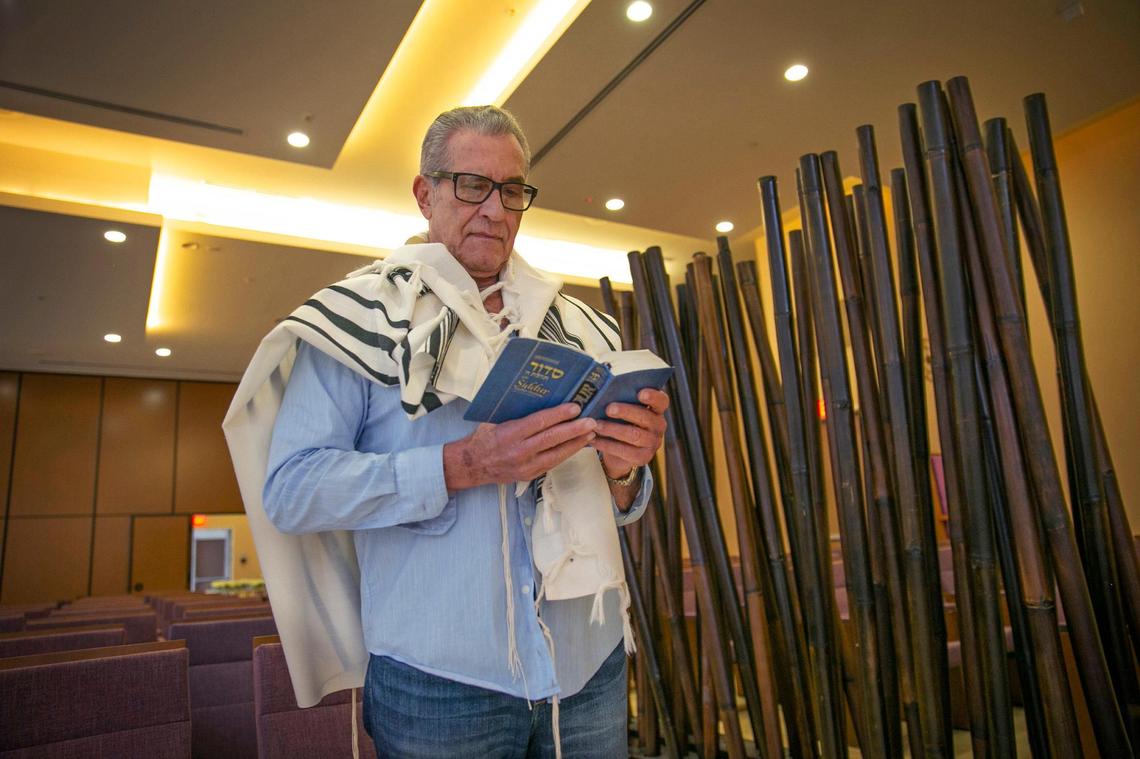 Steve Rosenthal, a Champlain Towers South survivor, does his morning prayers at his temple The Rok Family Shul in Brickell wearing a shawl provided by the temple.
