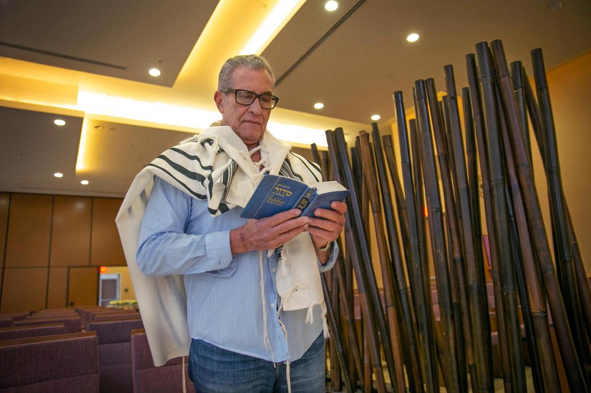 Steve Rosenthal, a Champlain Towers South survivor, at his temple. Rosenthal lost all his possessions save one item police found in the rubble: His cherished bar mitzvah bag containing his prayer shawl and tefillin.