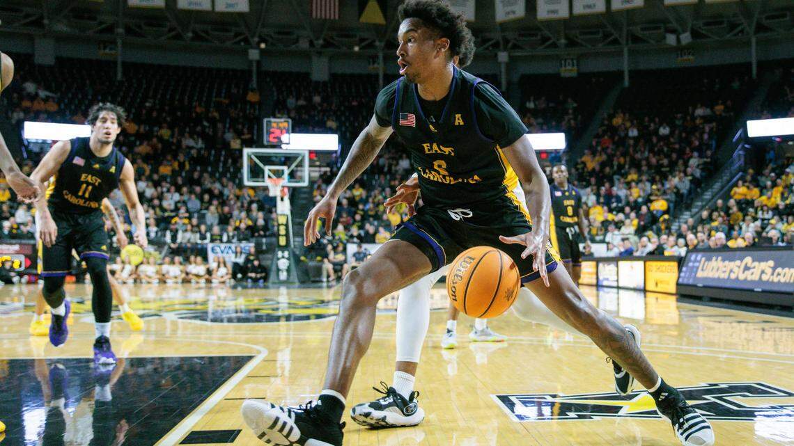 Jan 24, 2024; Wichita, Kansas, USA; East Carolina Pirates forward Brandon Johnson (6) drives to the basket during the second half against the Wichita State Shockers at Charles Koch Arena. Mandatory Credit: William Purnell-USA TODAY Sports