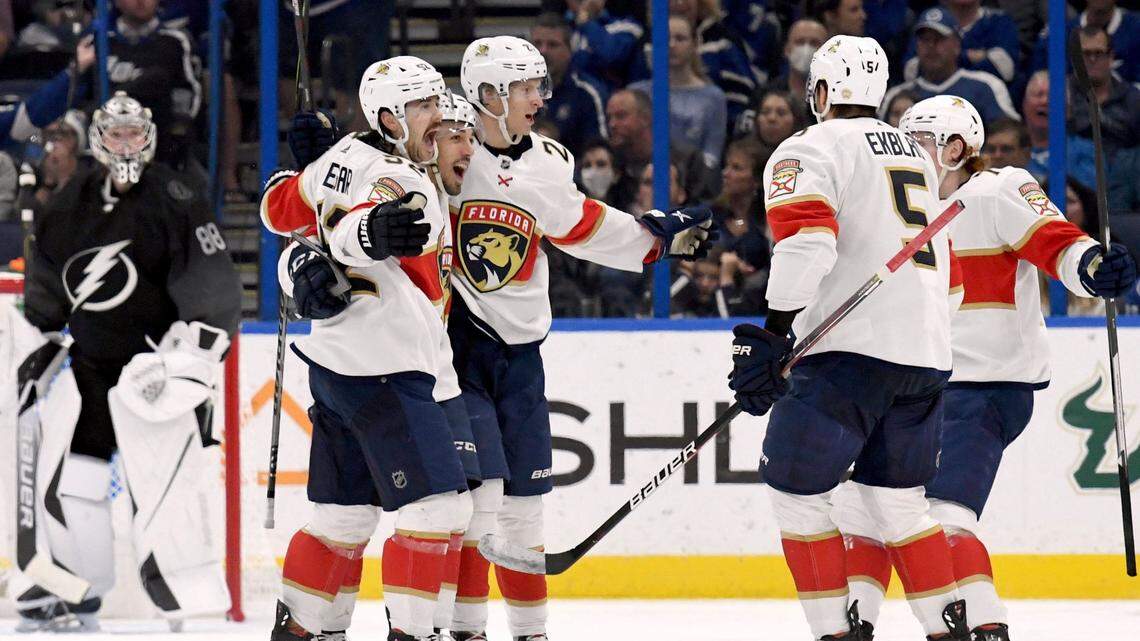 Florida Panthers celebrate a second-period goal during an NHL hockey game against the Tampa Bay Lightning on Saturday, Nov. 13, 2021, in Tampa, Fla. (AP Photo/Jason Behnken)