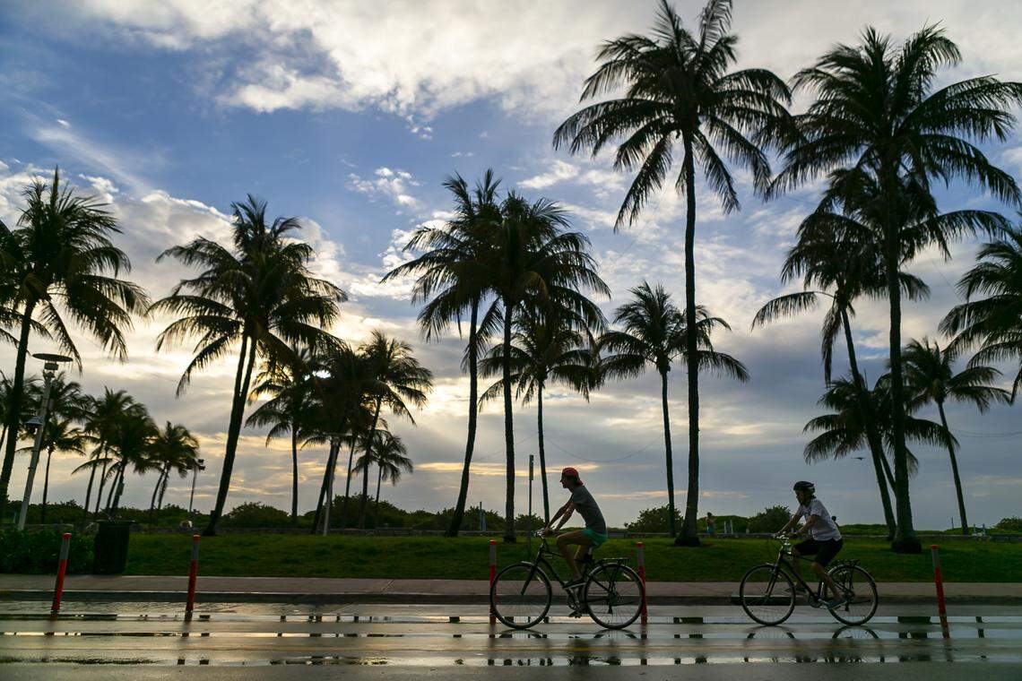 Bikers make their way down Ocean Drive in Miami Beach, Florida on Wednesday, April 1, 2020. Concerns over COVID-19 have continued to increase all across Miami-Dade, causing business closures, unemployment and economic struggles.