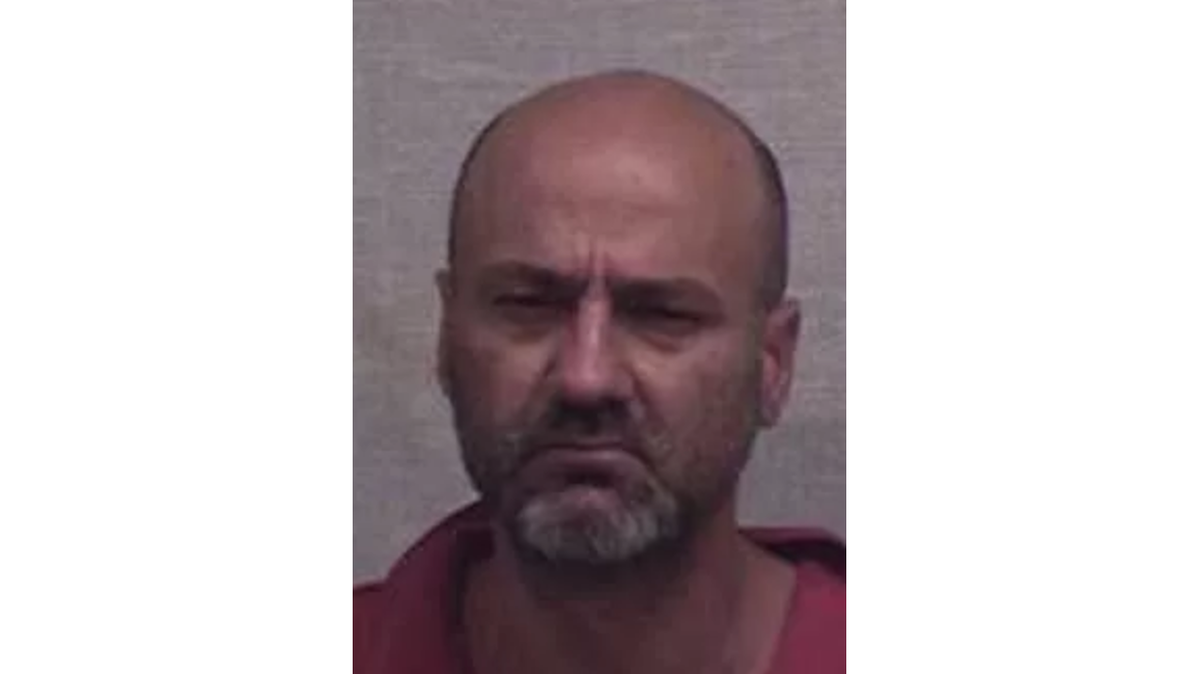 Police say Curtis Collman III ate meth, thinking it was cereal, and died after his dad Curtis Gilbert Collman II, pictured above, refused to call 911. The father held a friend at gunpoint to stop her from calling, police say.