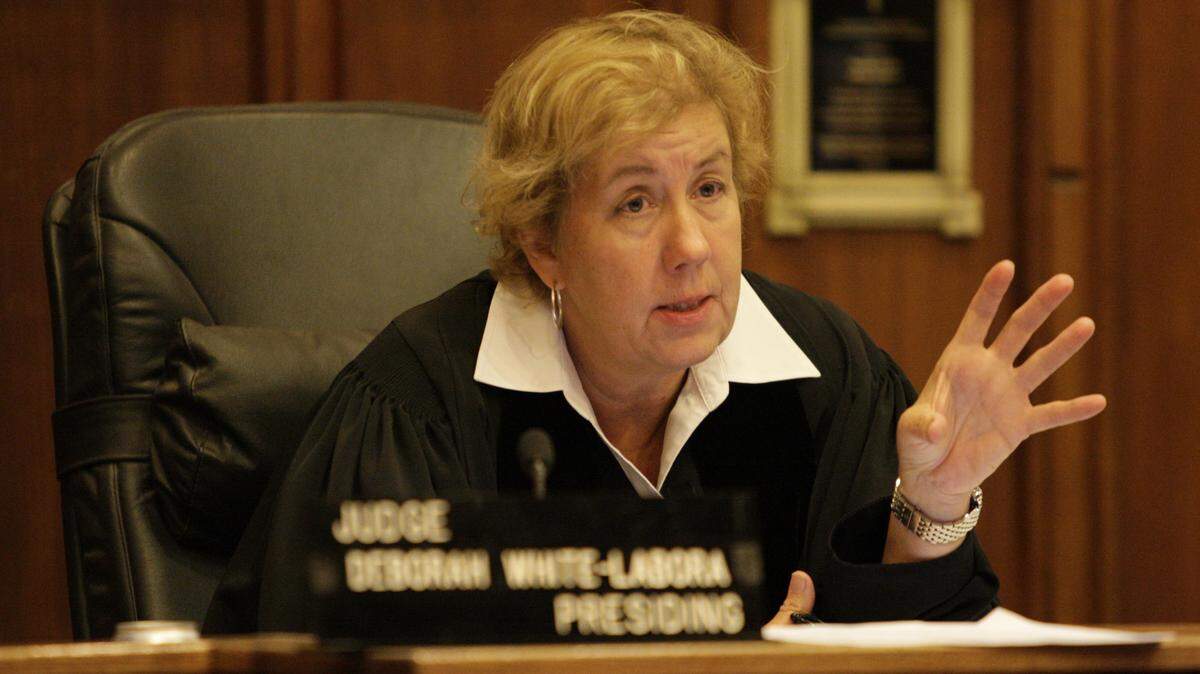 Miami-Dade County Judge Deborah White-Labora, who formerly headed the circuit's renown drug court, is facing a public reprimand after she wrote a letter vouching for a former mental-health worker convicted of Medicare fraud.