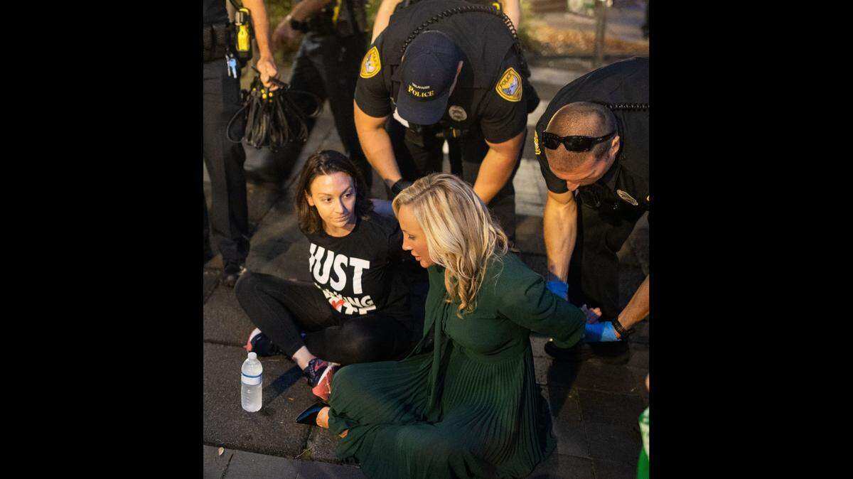 Sen. Lauren Book, right, Florida Democratic Chairperson Nikki Fried and about a dozen activists who were protesting a proposed ban on abortions after six weeks, were arrested outside Tallahassee City Hall on Monday, April 3, 2023.