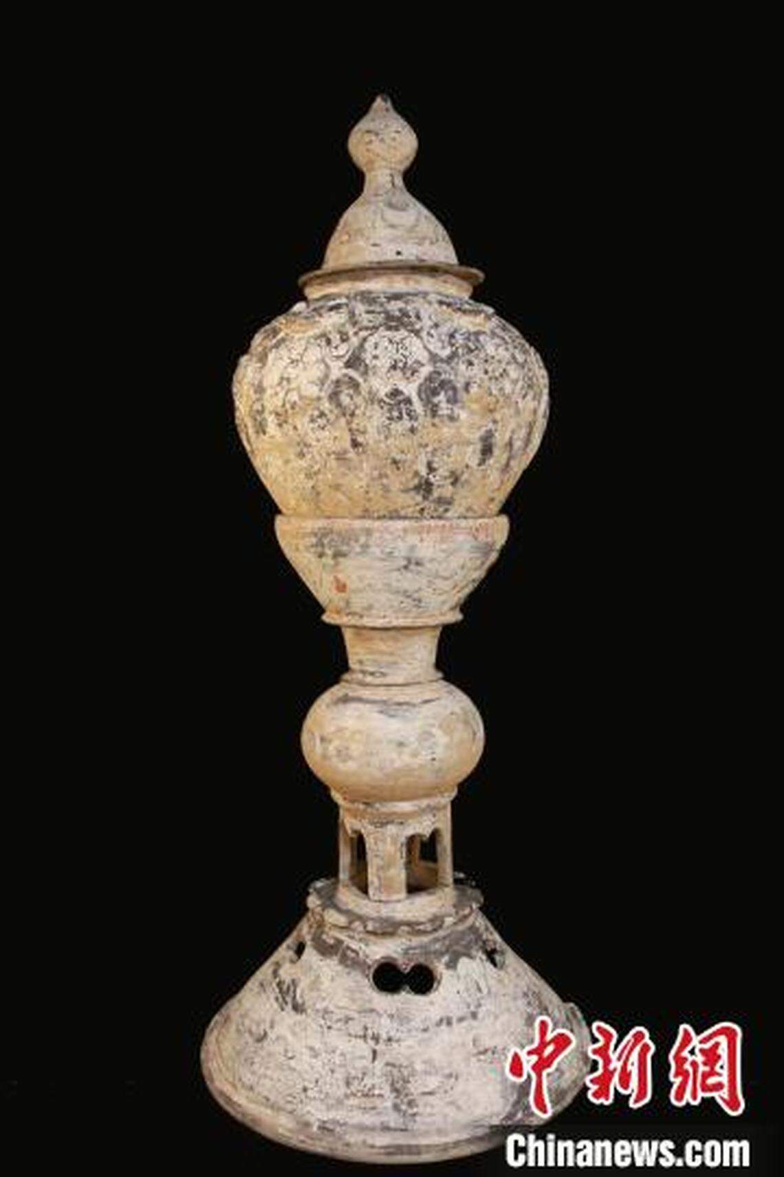 A tower vase found at the cemetery.
