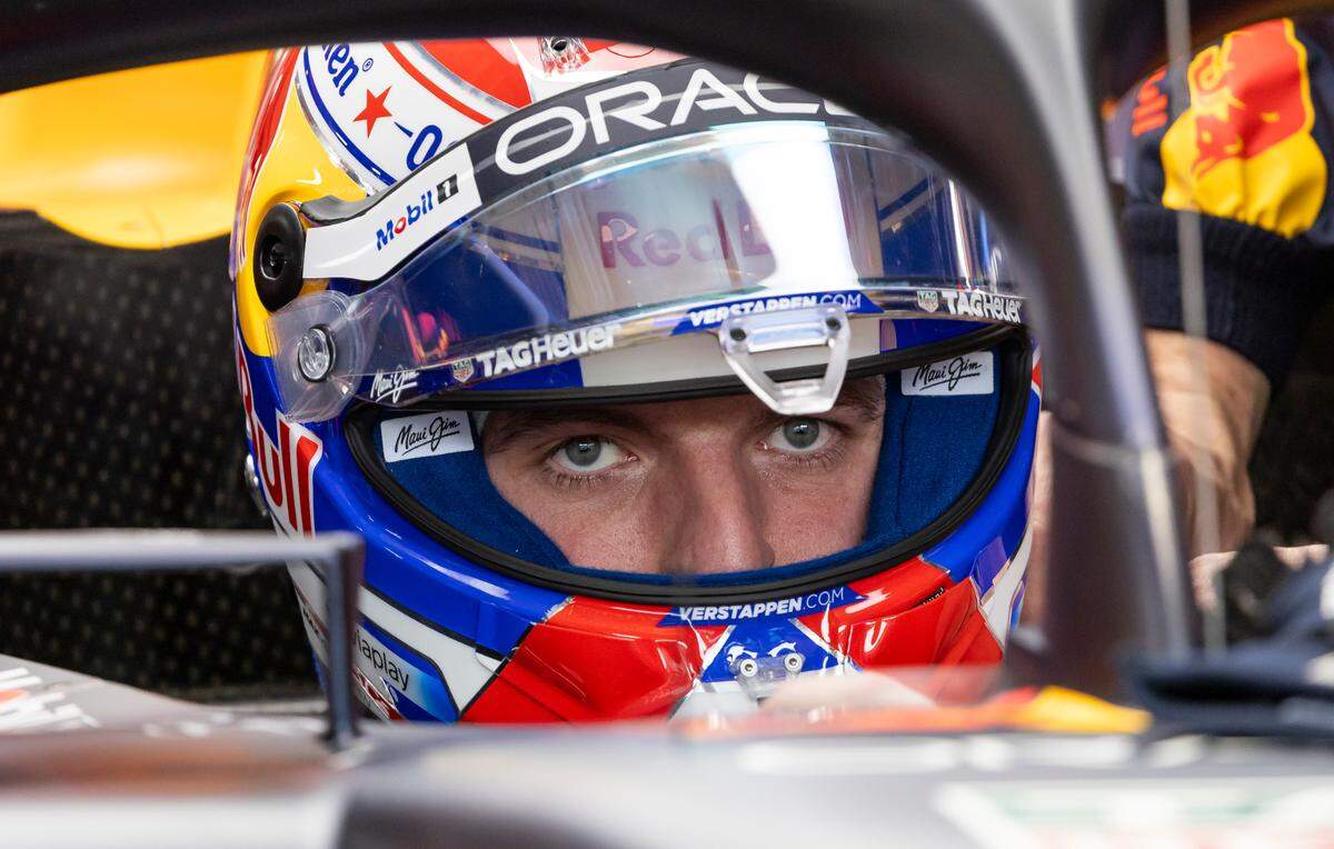 Red Bull Racing driver Max Verstappen of Netherlands looks on from his car before his Sprint race on the second day of the Formula One Miami Grand Prix at the Miami International Autodrome on Saturday, May 3, 2025, in Miami Gardens, Fla.