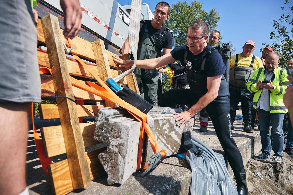 An arch weighing more than 400 pounds was pulled from the river.