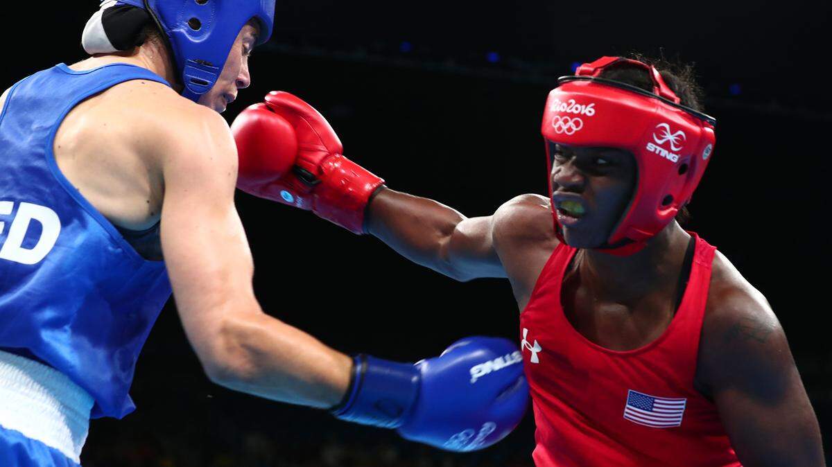Claressa Shields, right, of the U.S. battles Nouchka Fontijn of the Netherlands in the women’s middleweight final on Sunday, Aug. 21, 2016 at Riocentro Pavilion 6 in Rio de Janeiro, Brazil. Shields won by a unanimous decision.
