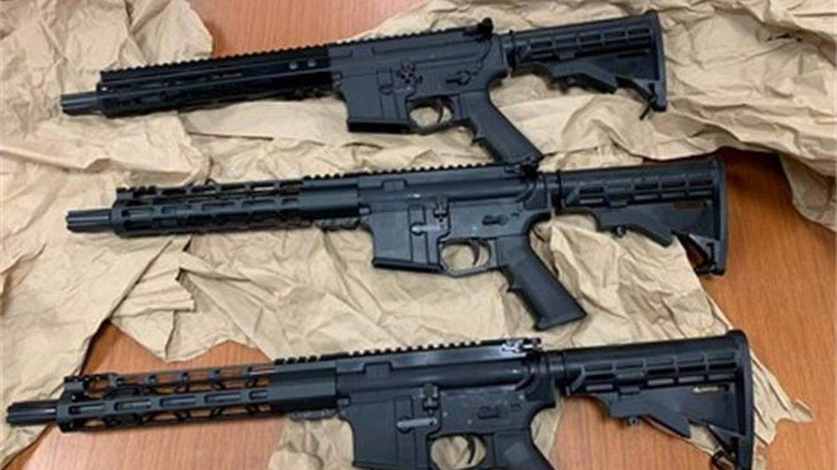 Federal agents seized these unregistered weapons from Miami Gun Shops as part of a firearms case against the federally licensed dealer and an employee.