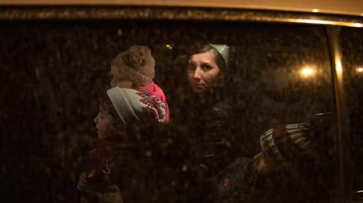 A somber Ukrainian woman in the midst of Russia’s war on her country.
