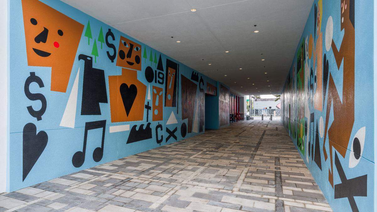 A large-scale mural inspired by Overtown, a historic Black neighborhood in Miami, at Miami Worldcenter. The mural was made by artist Nina Chanel Abney. Photo by Oriol Tarridas.
