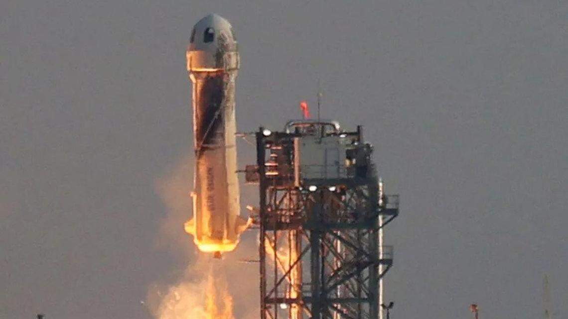 Jeff Bezos is aboard Blue Origin’s New Shepard rocket as it lifts off in Van Horn, Texas.