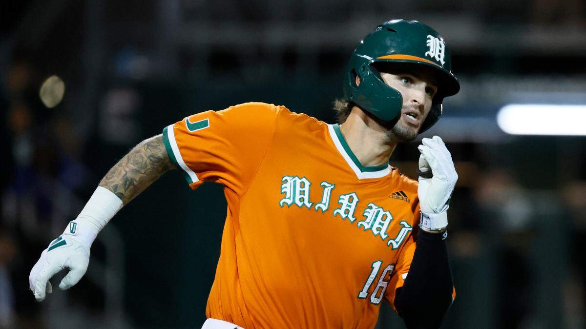 Miami Hurricanes outfielder Bobby Marsh (16) runs on a double against Niagara University at Alex Rodriguez Park at Mark Light Field on the University of Miami Campus in Coral Gables, Florida on Friday, February 14, 2025.