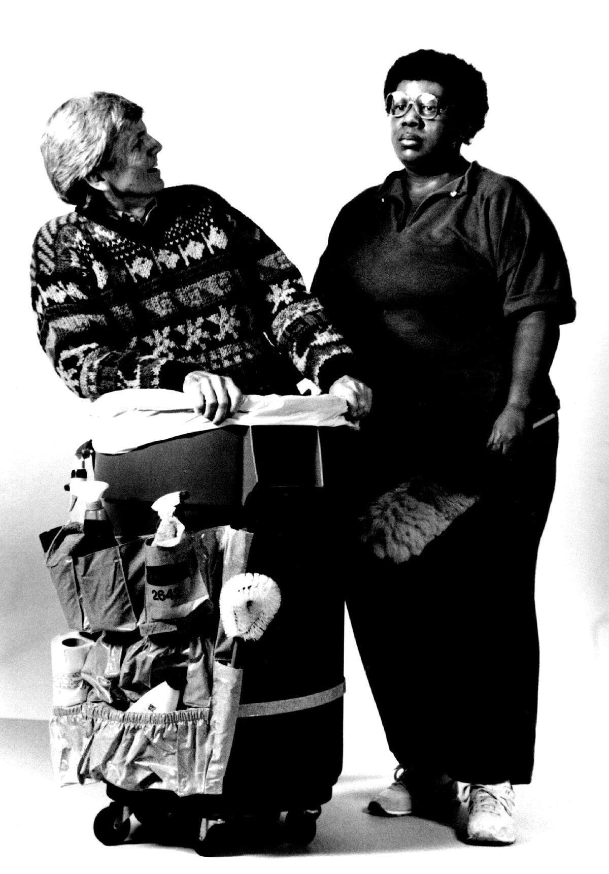 In 1988, artist Duane Hanson becomes part of his own reaistic sculpture of “Queenie the Cleaning Woman.”