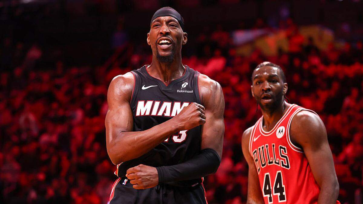 Bam Adebayo #13 of the Miami Heat celebrates after a dunk in front of Patrick Williams #44 of the Chicago Bulls during the second quarter of the game at Kaseya Center on February 01, 2026 in Miami.