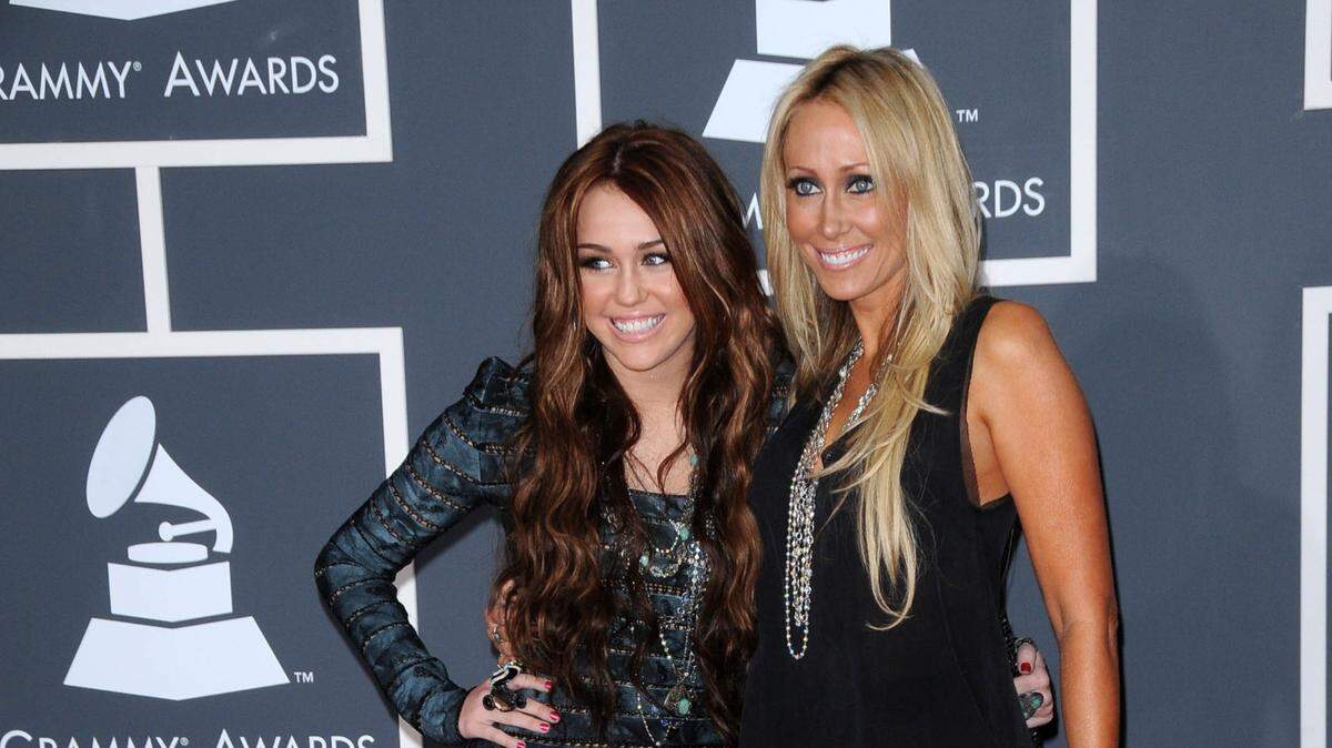 Tish Cyrus clears up why she wasn’t following her daughter.