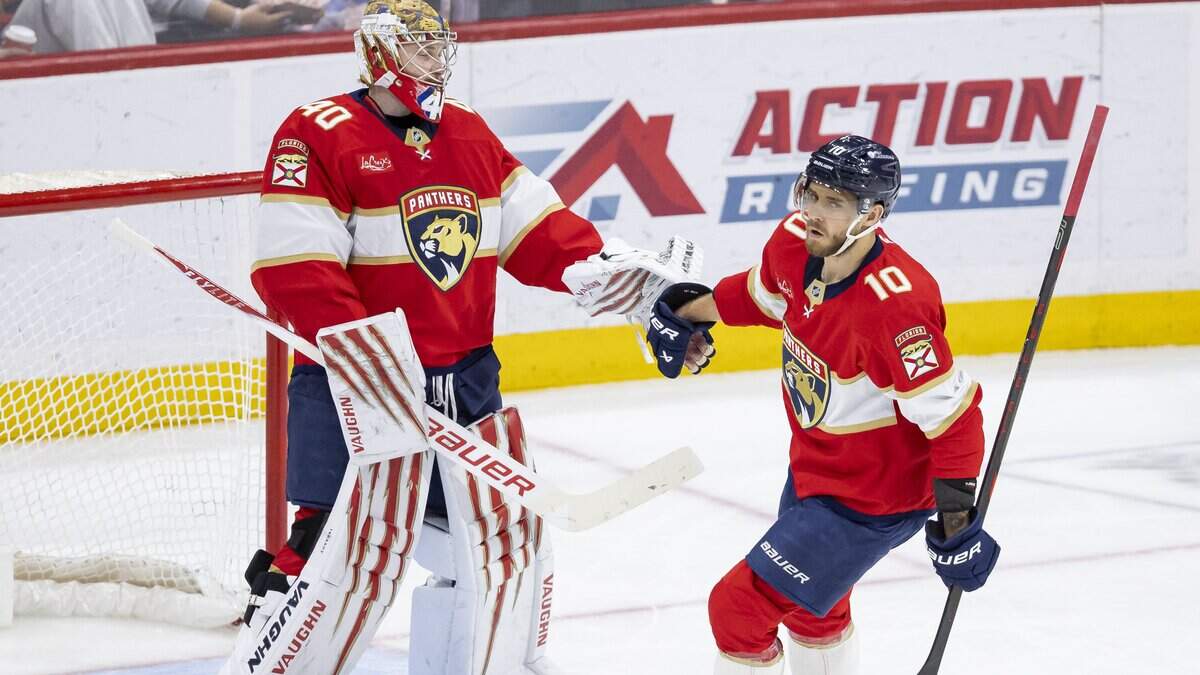 Florida Panthers left wing A.J. Greer (10) celebrates with goaltender Daniil Tarasov (40) after scoring against the Detroit Red Wings Detroit Red Wings in the second period of their NHL game at the Amerant Bank Arena on Wednesday, April 15, 2026, in Sunrise, Fla.