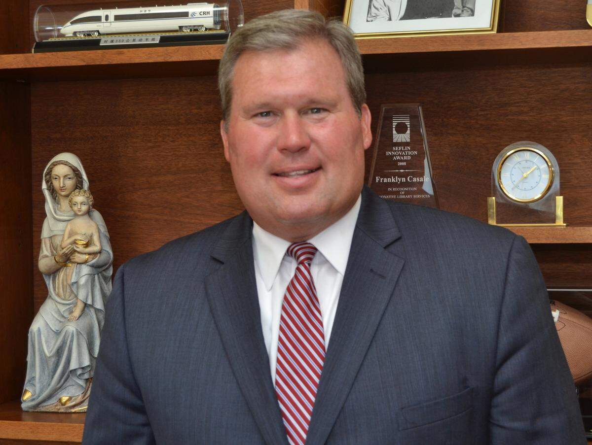 David A. Armstrong in the president’s office at St. Thomas University, where he was scheduled to start formal duties on Aug. 1, 2018, as the university’s 10th president.