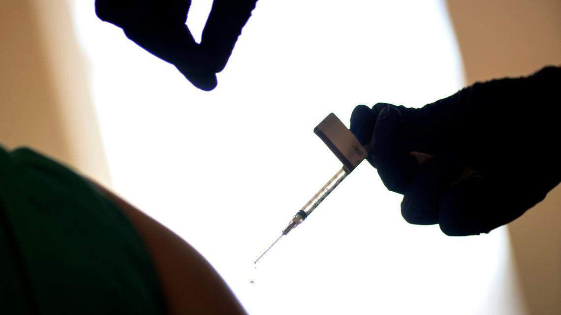 A woman was arrested in Long Island, New York, after being accused of giving a teen a COVID-19 vaccine without parental consent, Nassau County police said.