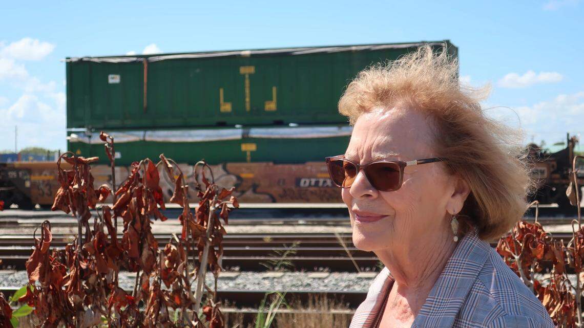 Fort Pierce Mayor Linda Hudson looks on at a rail yard in her city where train cars full of trash are shipped in from Miami-Dade County. The trash is offloaded at the rail yard and driven across St. Lucie County to reach a landfill in neighboring Okeechobee County.