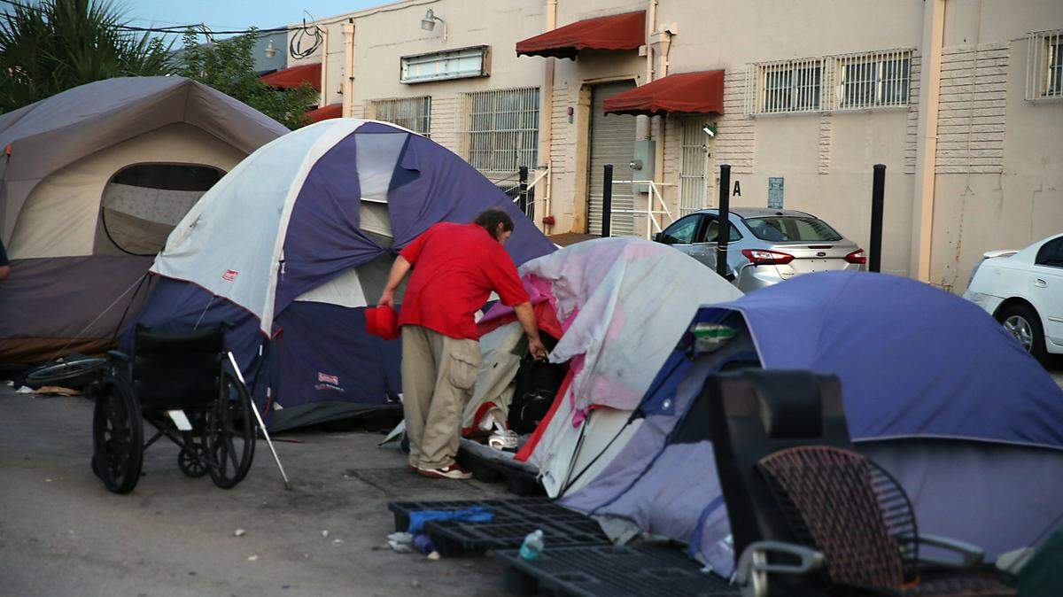 The scene from a tent encampment of registered sex offenders outside of Hialeah in August 2017. Nine moths later, it remains. But Miami-Dade says it is ready to dismantle the village, and a judge has sided with the county.
