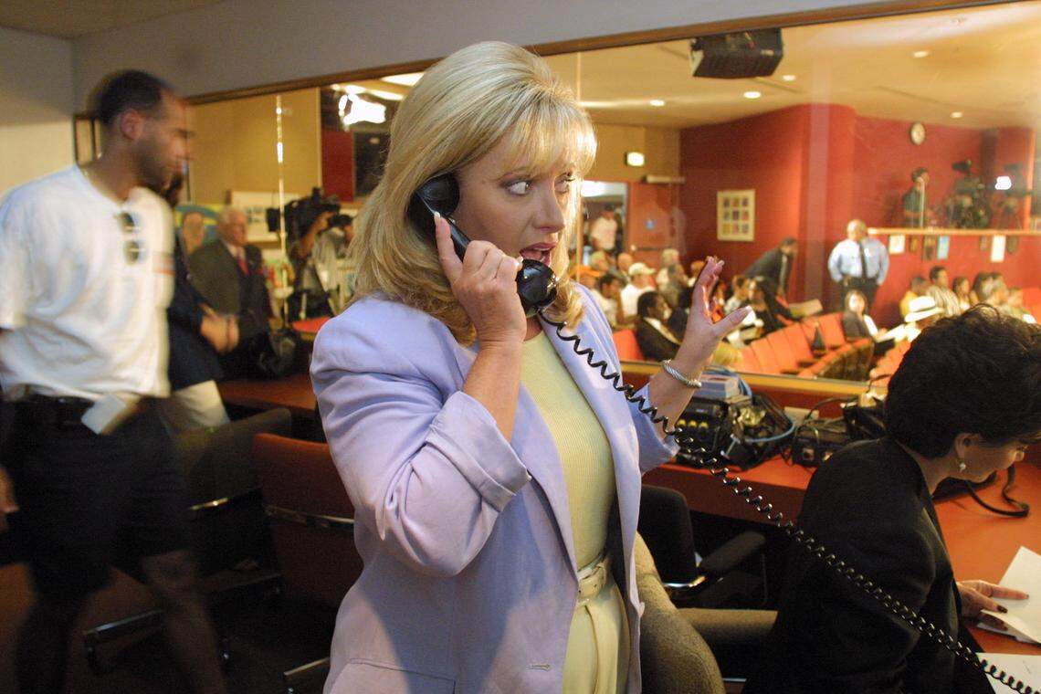 In this April 19, 2001 file photo, Jilda Unruh, then an investigative reporter for WPLG Local 10, probed into the Miami-Dade County School Board and is seen here at its chambers covering a meeting.