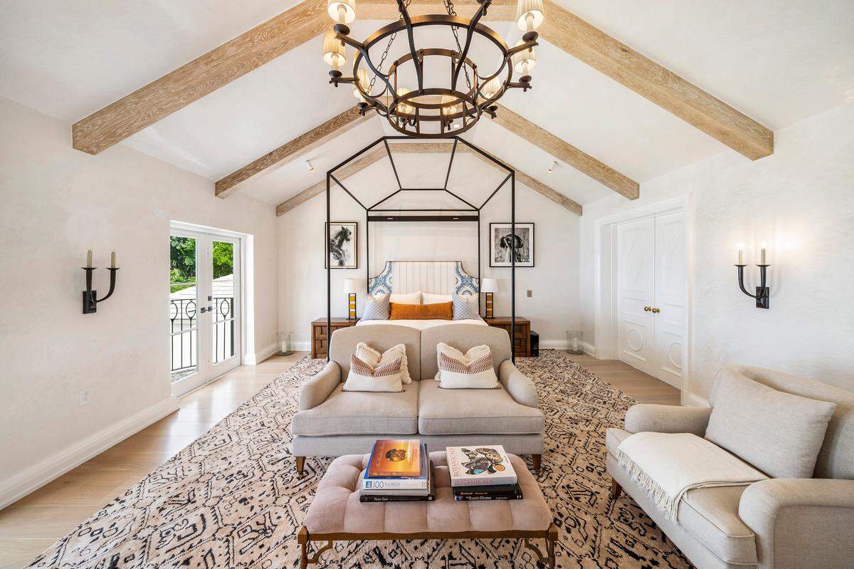 The house has eight bedrooms and eight bathrooms. This is one of the bedrooms.