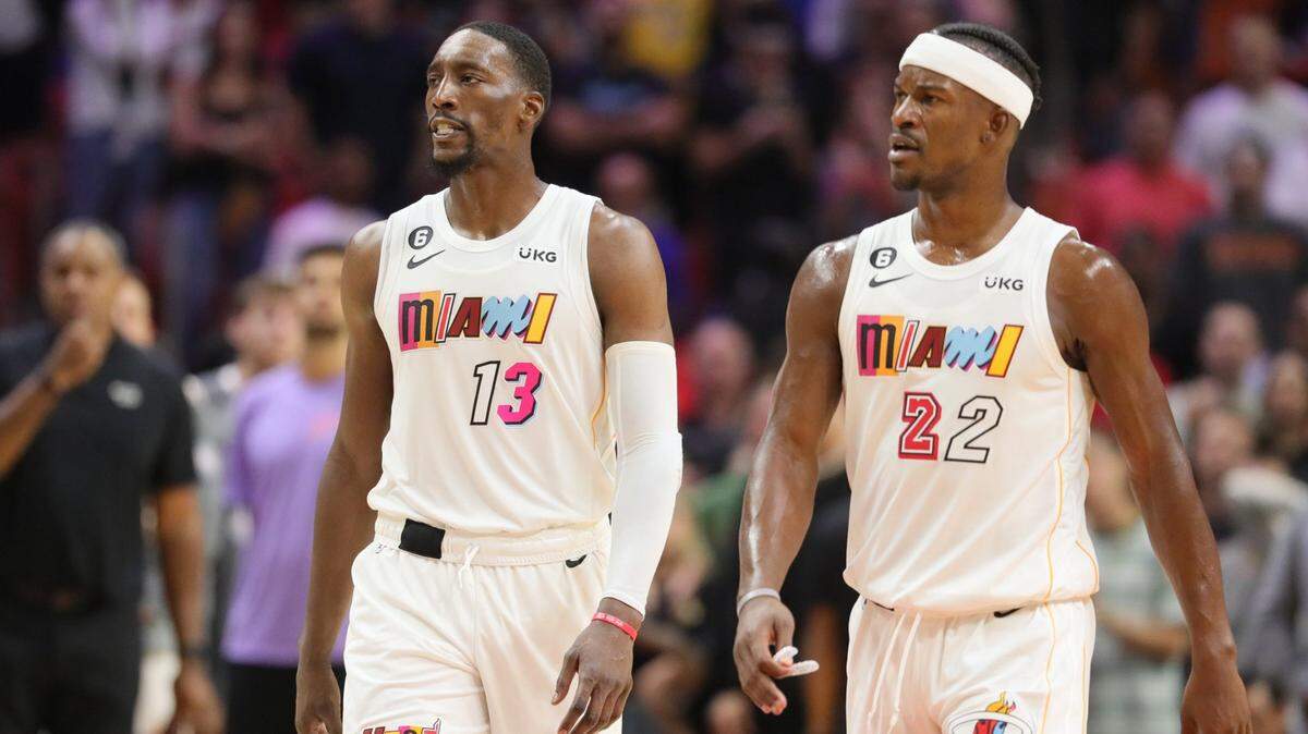 Miami Heat center Bam Adebayo (13) and forward Jimmy Butler (22) on the court in the fourth quarter against the Charlotte Hornets at Miami-Dade Arena in Miami on Thursday, November 10, 2022.